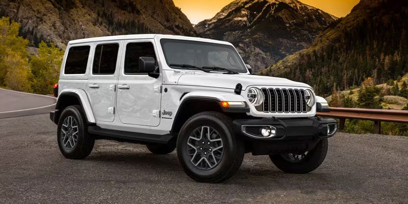 White Jeep Wrangler four-door SUV