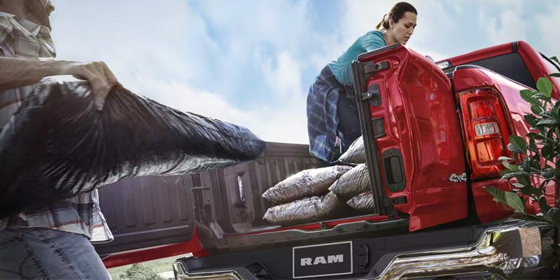 Ram truck bed with cargo loading
